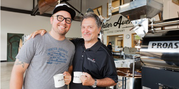 Bruce Milletto (right) and his son, Matt, in Water Avenue Coffee's roastery. 