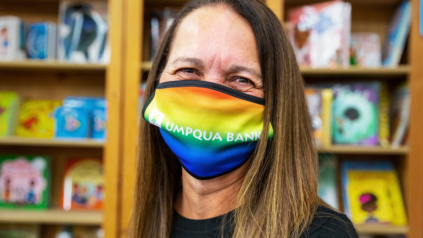 Umpqua Associate wearing pride mask