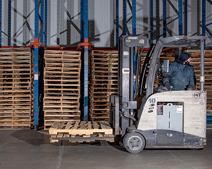 Workers pulling a cart