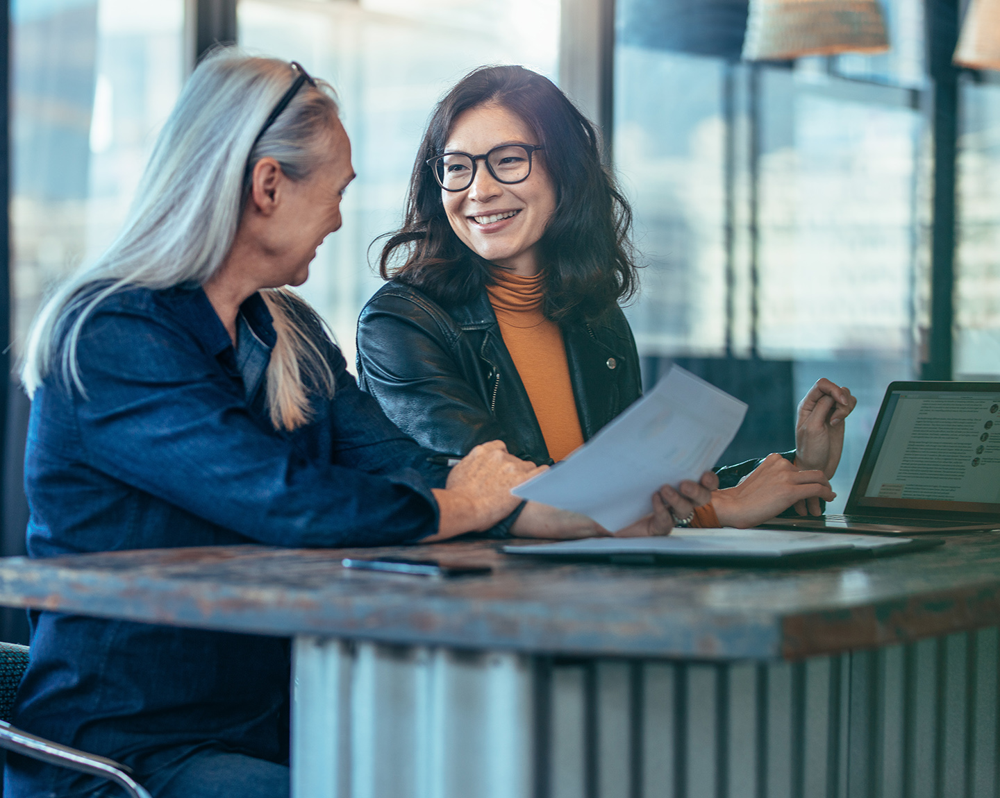 female banker is talking with a customer